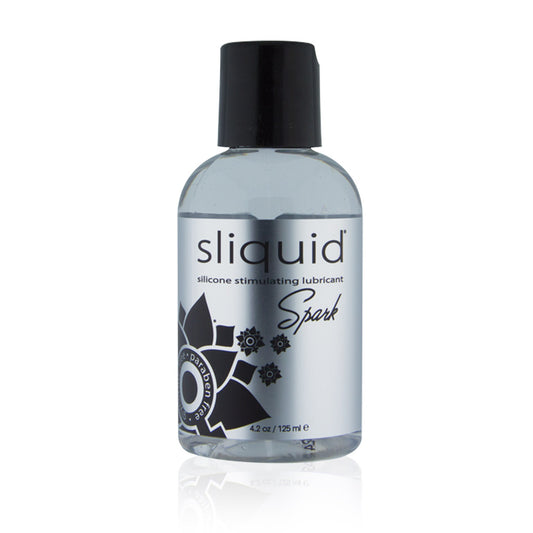 A bottle of Sliquid Natural Spark Booty Buzz, 4.2 oz is shown against a white background. 
