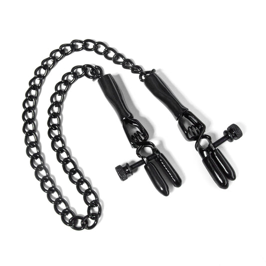 The black spring jaw nipple clamps are shown laying against a white background
