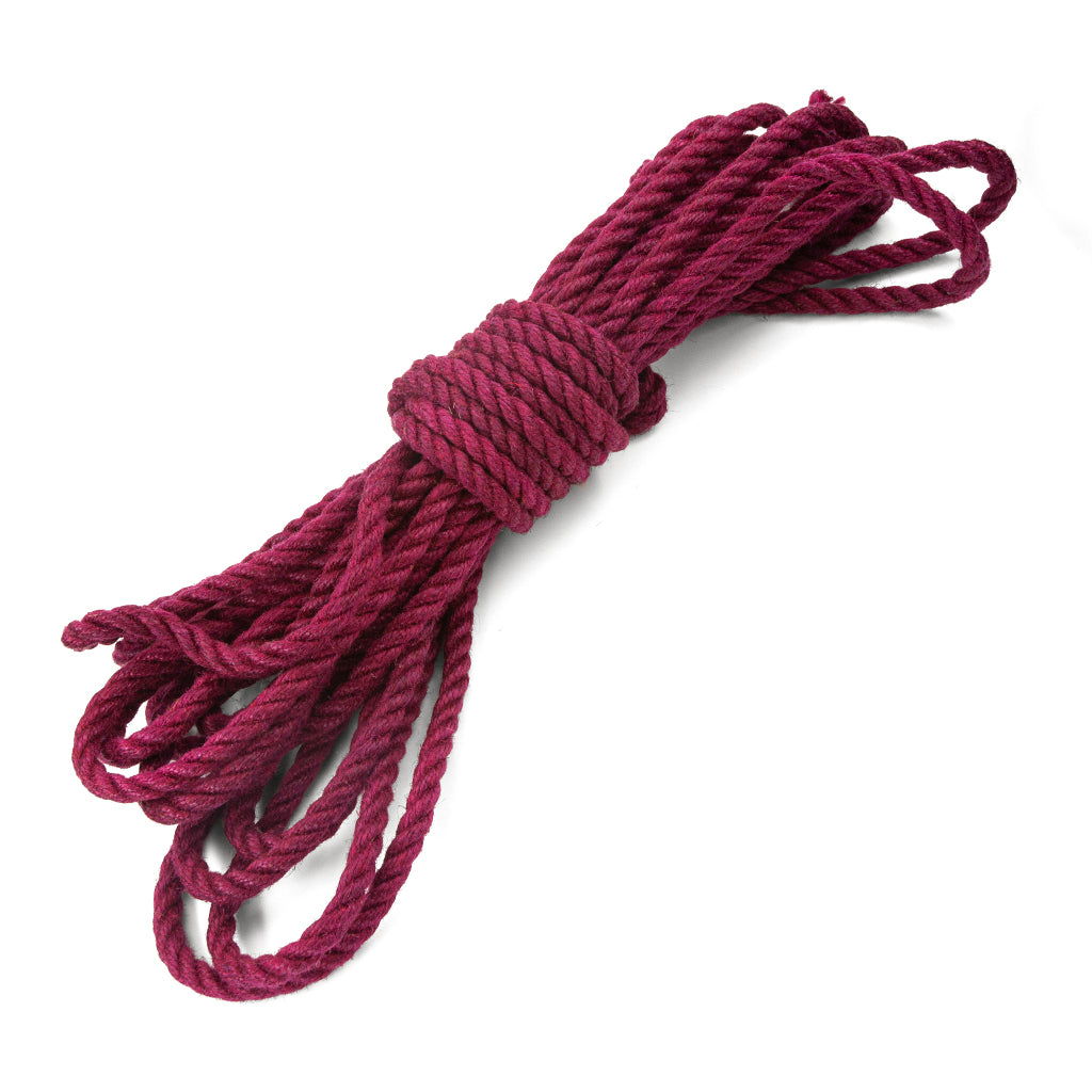 The wine colored jute waxed rope is shown tied in a bundle on a white background. 