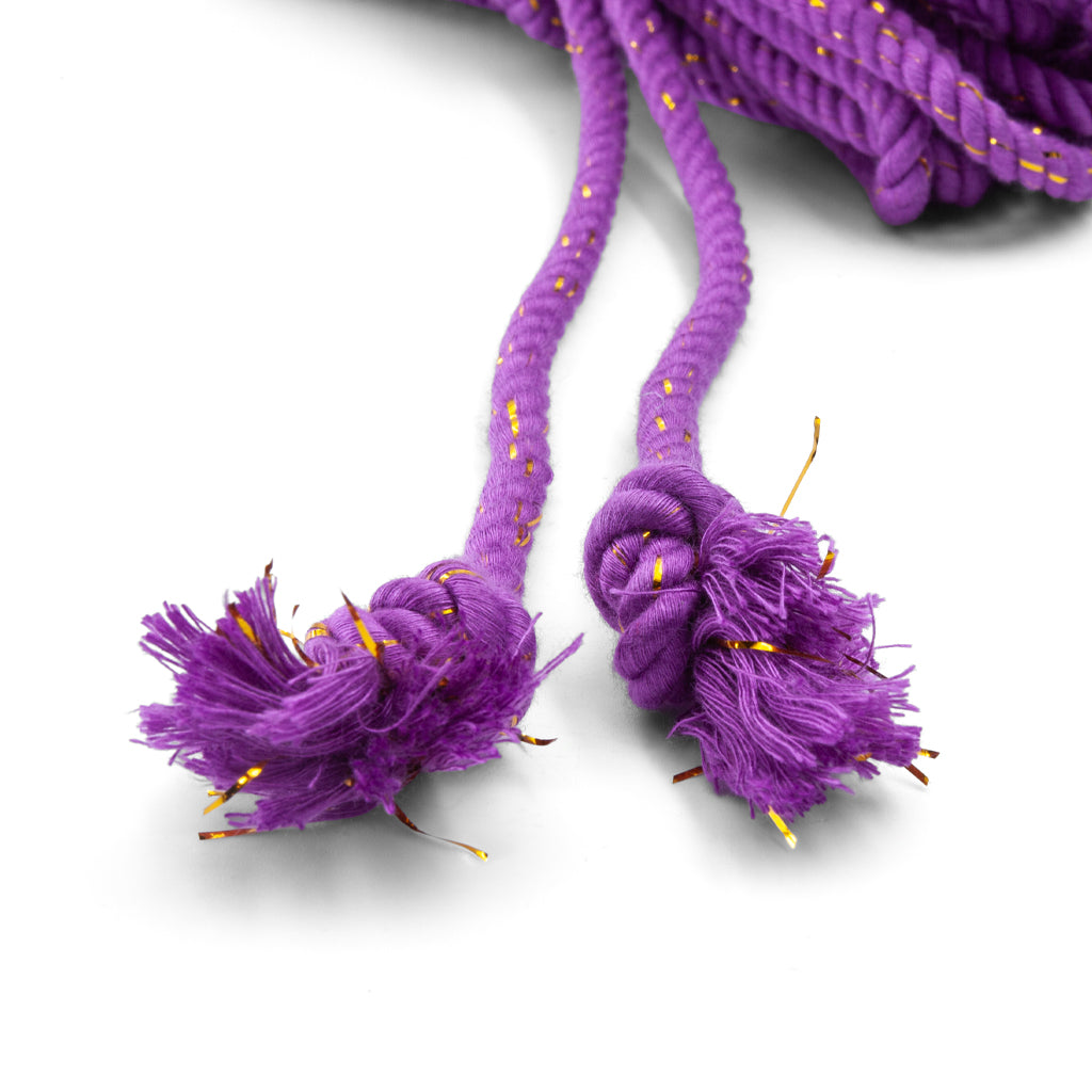 the knotted ends of the purple bamboo silk conductive rope are shown on a white background.