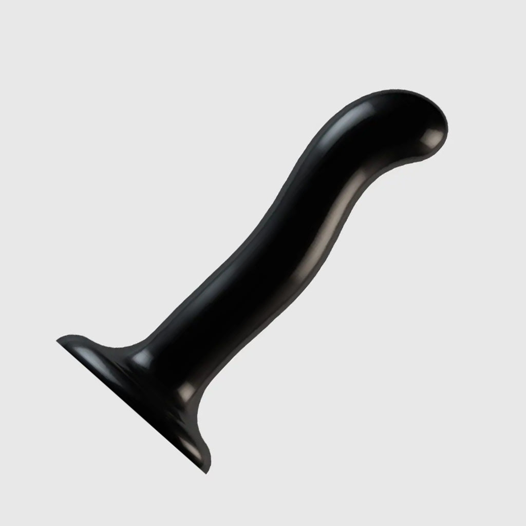 The black Strap-On-Me P&G spot dildo is shown on a light gray background. 