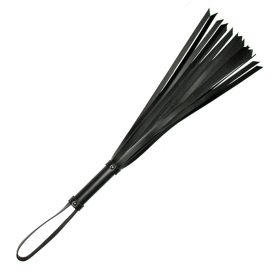 The 24-inch Basic Black Leather Flogger is shown against a blank background. The flogger has many thin falls with slightly slanted ends. The handle is cylindrical and wrapped in black leather. There is a leather wrist loop at the base of the handle.