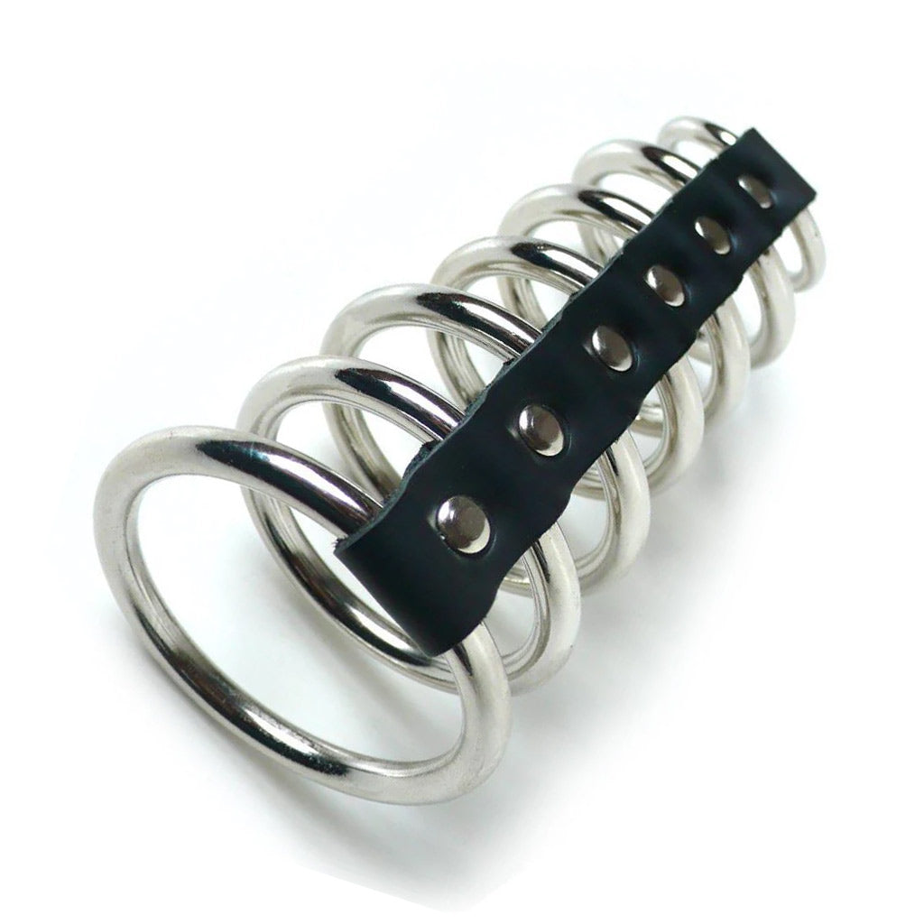 The 7 Gates of Hell is displayed against a blank background. It consists of 7 metal O-rings, gradually decreasing in size, held together and spaced apart by a black leather strip.
