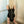 Load image into Gallery viewer, A blonde woman in black underwear is shown from behind, kneeling in a corner. She wears a black arm binder with metal hardware. The arm binder has a long zipper in the center and a D-ring at the fingertips. 
