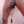 Load image into Gallery viewer, A close-up of a nude man’s pierced penis is shown. He is wearing the Spiked Parachute Ball Stretcher, which has a weight attached to the chains hanging off of it, pulling his balls downwards.
