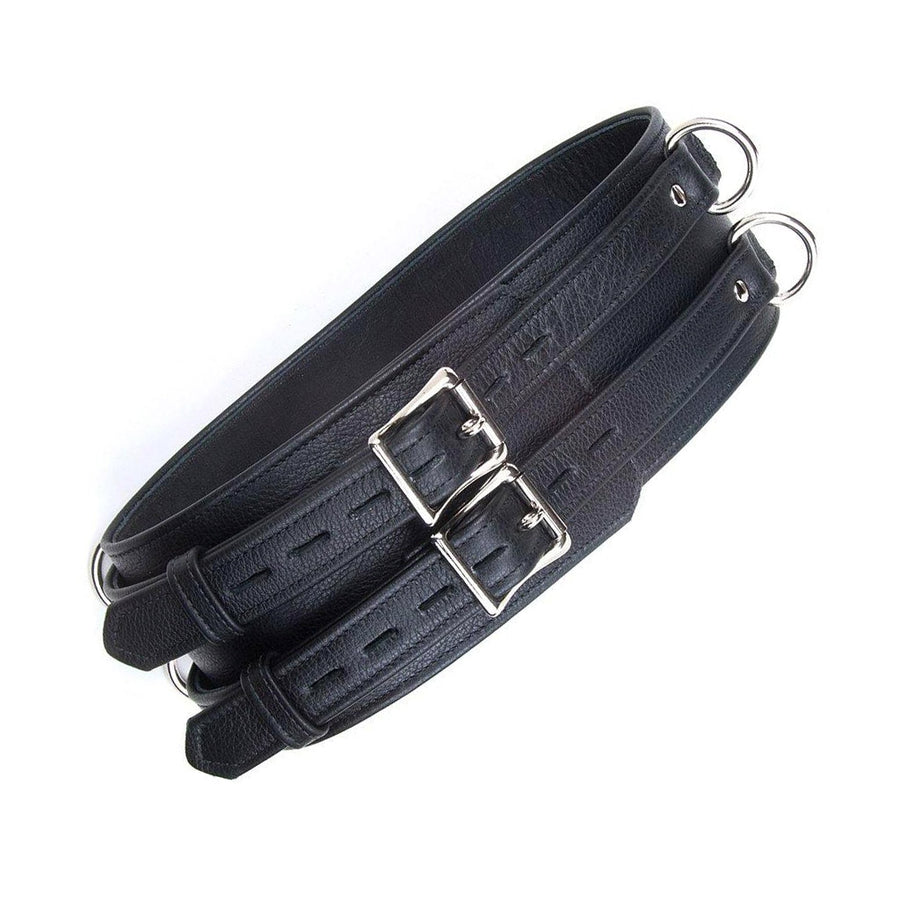 A black Premium Garment Leather Locking Waist Cuff is shown against a blank background. It is made of a thick piece of leather and metal hardware. It has two vertically stacked D-rings on each side and two adjustable straps with locking buckles.