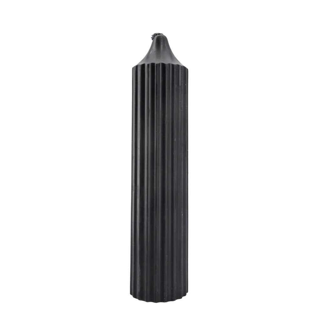 The black scented was play drip candle is shown against a white background. 