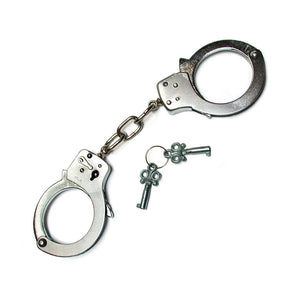 The silver Kinklab Basic Handcuffs are displayed against a blank background along with their keys. They resemble basic police cuffs with a short connecting chain.