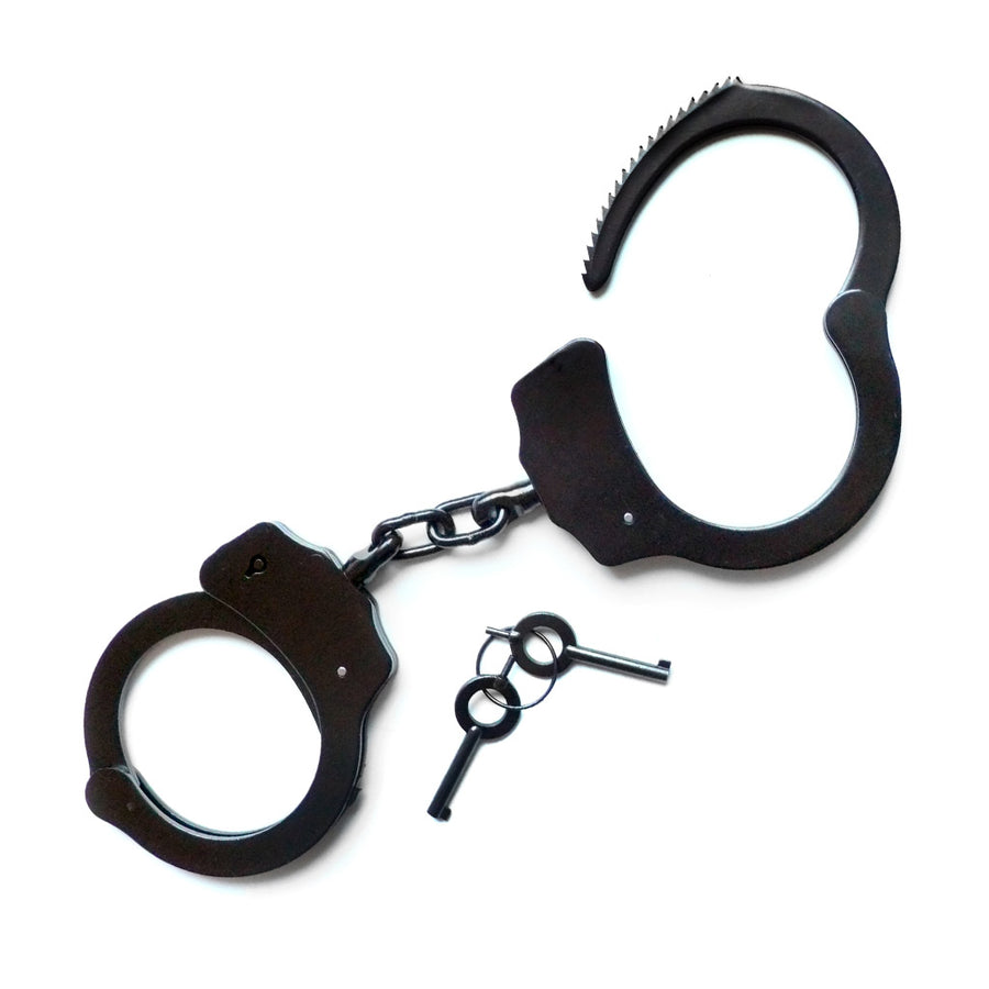 The black Kinklab Double-Lock Police-Style Handcuffs are displayed against a blank background along with their keys. They resemble basic police cuffs with a short connecting chain.