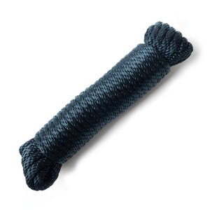 The black Kinklab Bondage Rope is shown coiled up against a blank background.