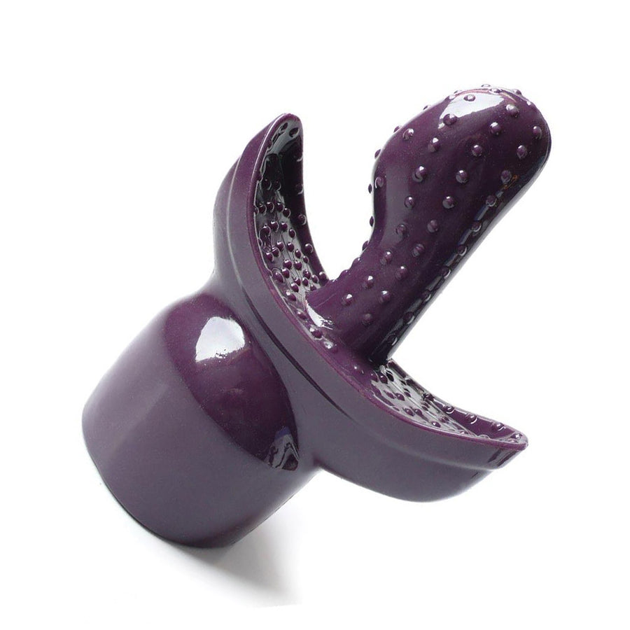 The VibeRite Double Agent wand attachment is displayed against a blank background. It is purple, and the base is shaped like the head of a wand vibrator. There is a textured, curved protrusion in the center. 