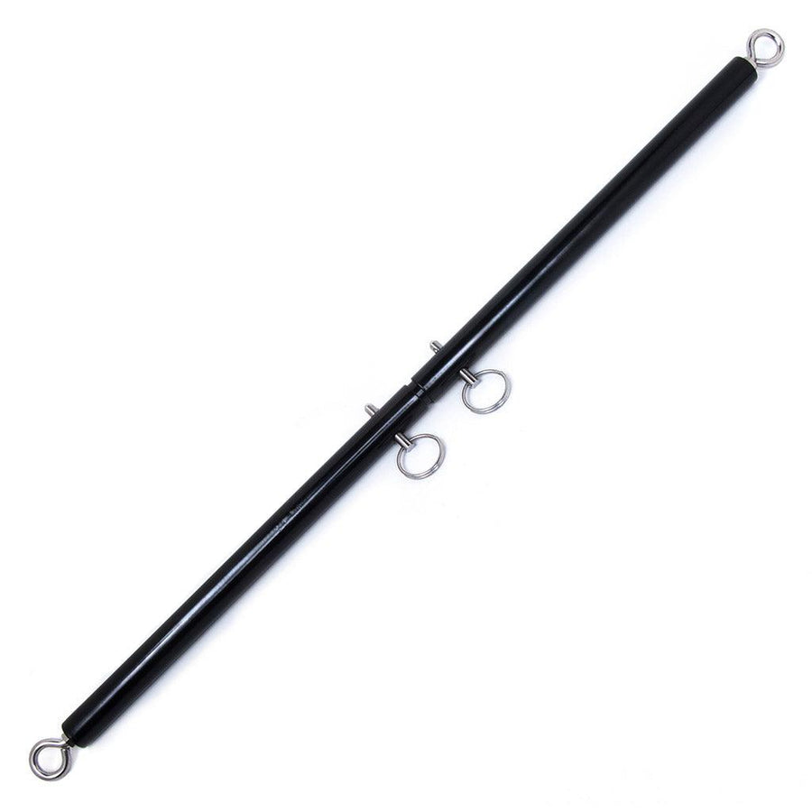 The black Adjustable General Purpose Spreader Bar is shown against a blank background. It is a thin black rod with a metal eyebolt on each end. There are two silver pins with loops in the bar’s center, which can be moved to adjust the bar’s length.