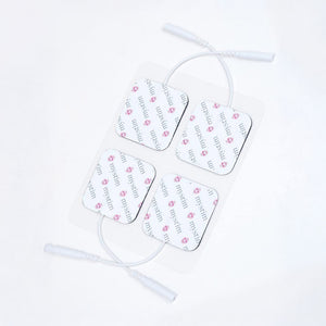  A set of four Mystim Electrodes, which are white squares with cords, are displayed against a blank background.