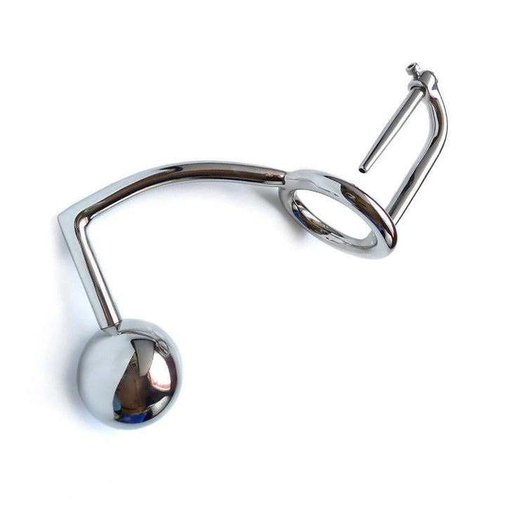 The silver stainless steel Trailer Hitch Convoy is displayed against a blank background. It is a hook with an anal plug ball at the shorter end and a cock ring at the other end. Above the cock ring is a small sounding rod.