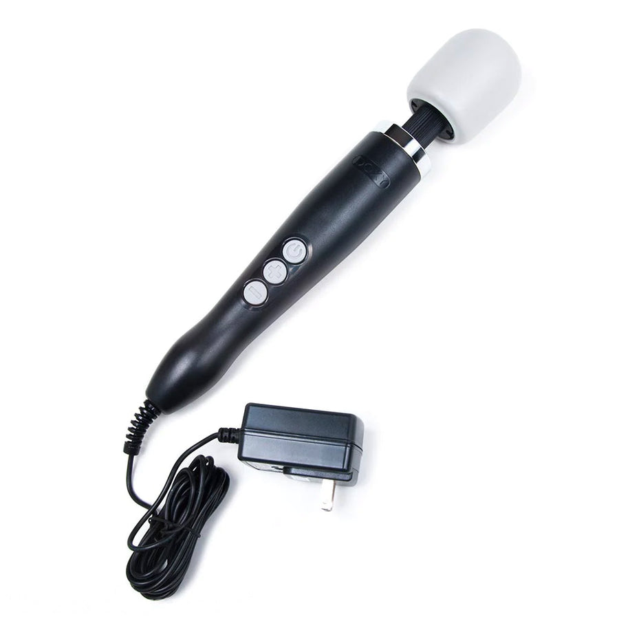 A Doxy Vibrating Wand Massager in Black is shown with the included power adaptor against a blank background.