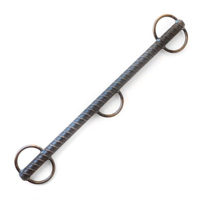 The 18 inch Rebar Spreader Bar is displayed against a blank background. The bar is made of metal with a ribbed texture and has five welded loops. Two of the loops are across from each other on each end and there is one in the middle.