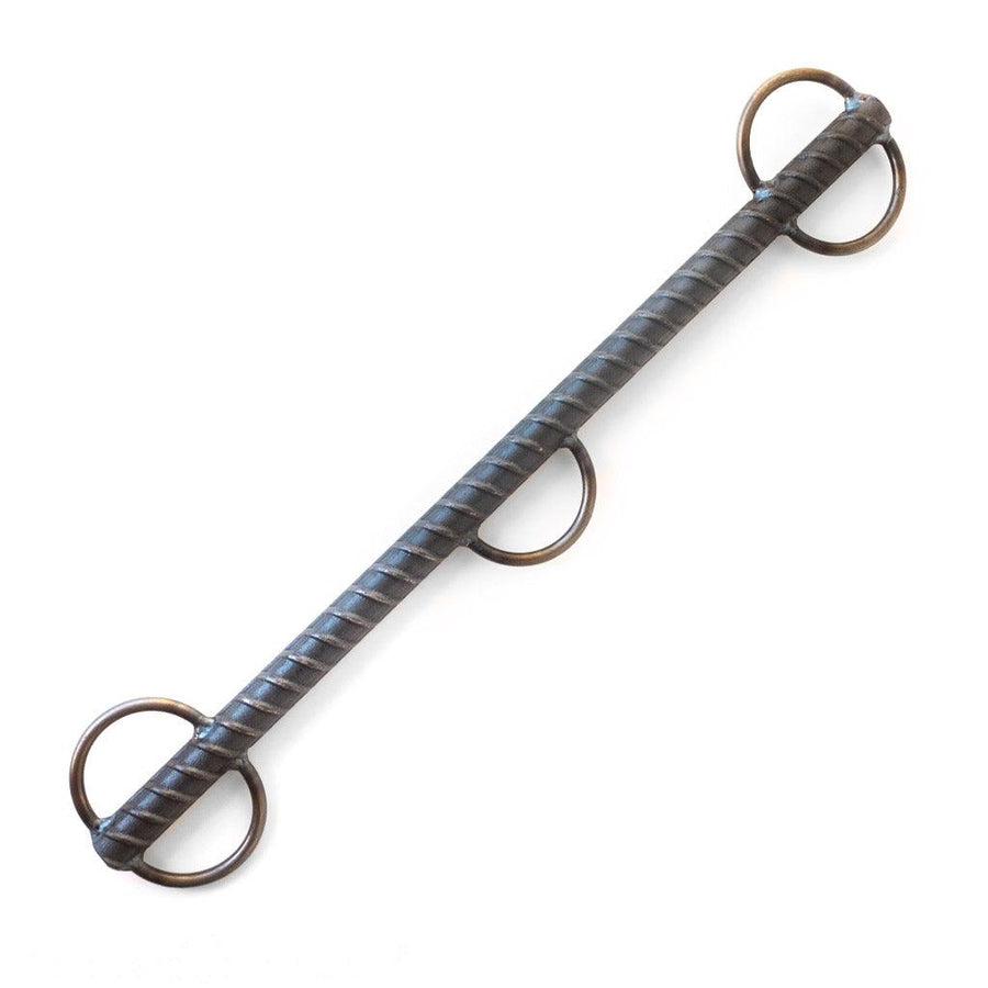 The 18 inch Rebar Spreader Bar is displayed against a blank background. The bar is made of metal with a ribbed texture and has five welded loops. Two of the loops are across from each other on each end and there is one in the middle.
