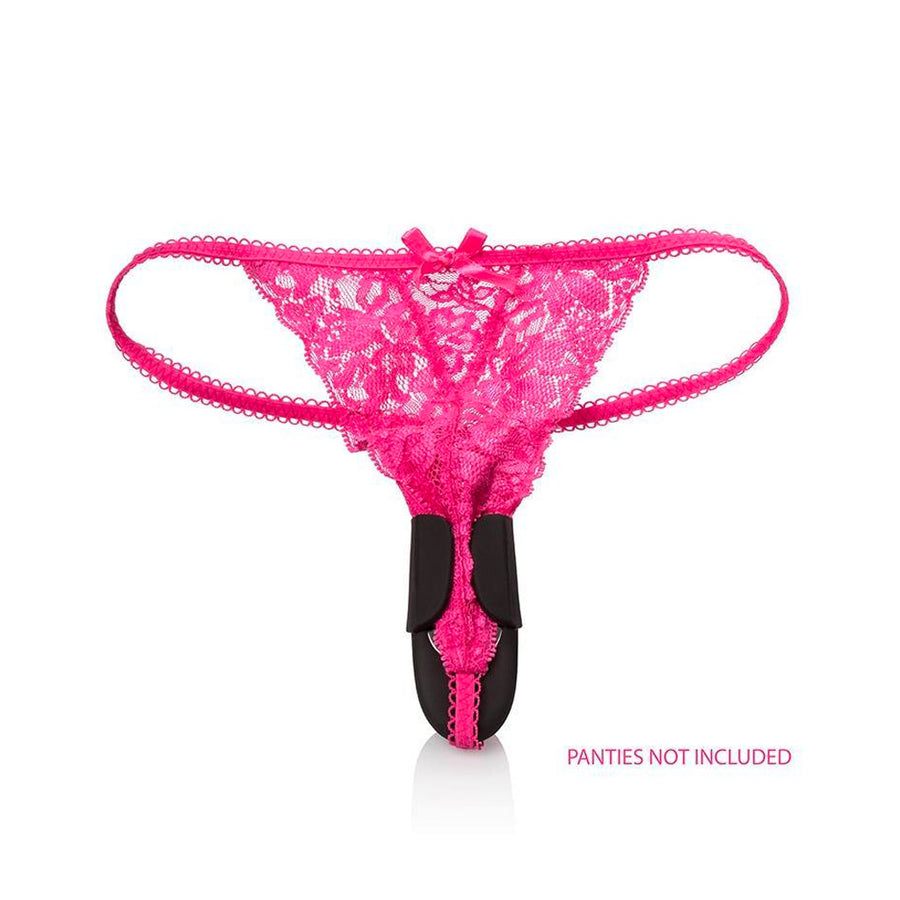 A pair of lacey, hot pink thong panties are shown against a blank background. The Lock-N-Play Remote Petite Panty Teaser is shown on the panties, with the vibrator on the inside and the small black wings folded over the edges of the panties to secure it.