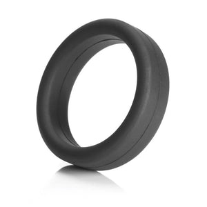  A Tantus Super Soft C-Ring in black is displayed against a blank background. It is a ring made of a thick band of matte black silicone.