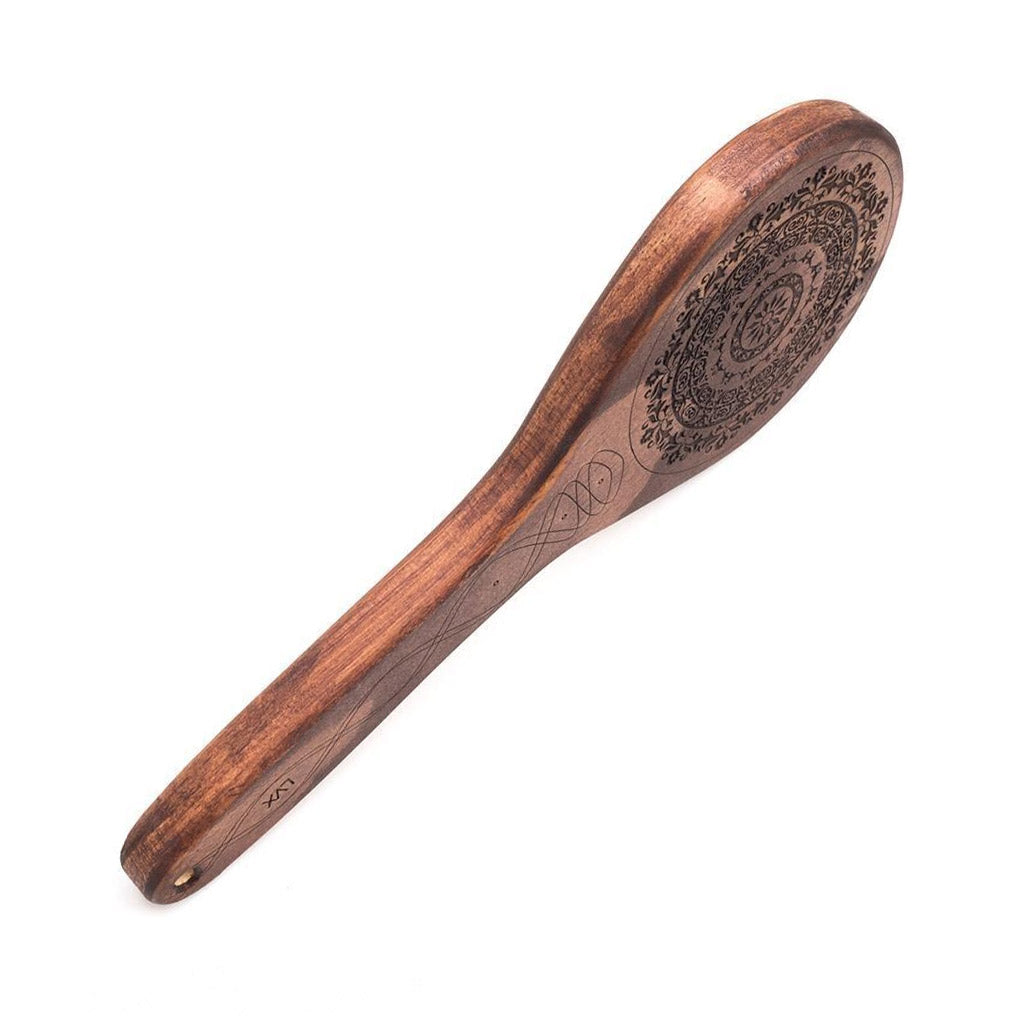 The Floral Engraved Wood Spanking Paddle is displayed against a blank background.