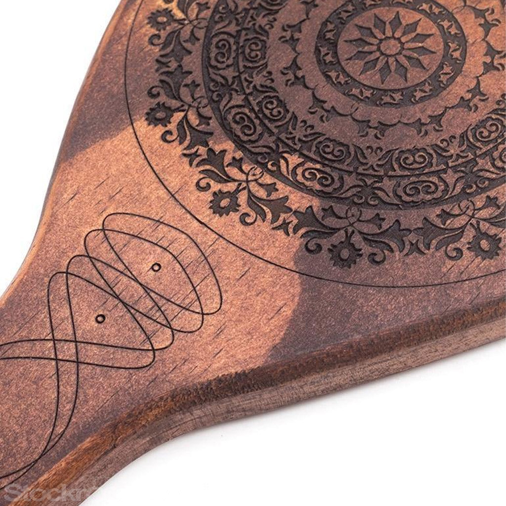 The Floral Engraved Wood Spanking Paddle is displayed against a blank background.