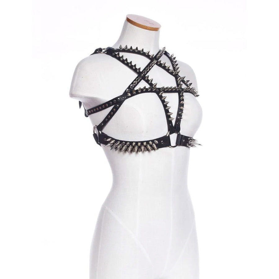 The black leather Spiked Pentagram Bust Harness is displayed on a female mannequin.