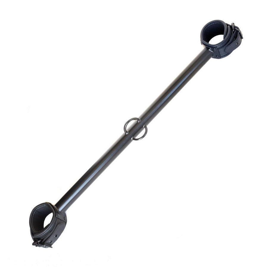 The black Big Barrel 22 Inch Ankle Spreader Bar With Cuffs is displayed against a blank background. The metal bar is thick and has three welded loops in the center. The bar has a black buckling neoprene cuff attached to each end.