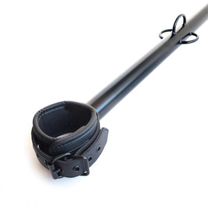 The black Big Barrel 22 Inch Ankle Spreader Bar With Cuffs is displayed against a blank background.