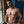 Load image into Gallery viewer, A nude man is shown standing in a room with brick walls and a dark blue swinging stall door. He is very muscular and has the Stainless Steel Clothespin Nipple Clamps on his nipples.
