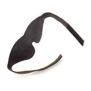 The BDSM Classic Cut Brown Leather Blindfold is displayed against a blank background with the strap un-velcroed. 