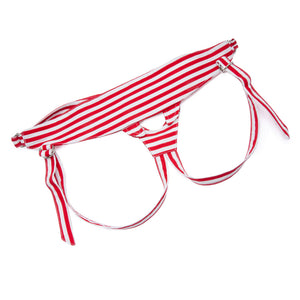 The Betty Fabric Strap-on Harness is displayed against a blank background. The harness is made of red and white horizontally striped fabric.