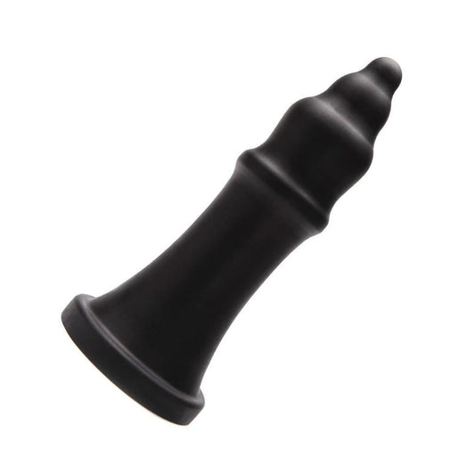 The black Tantus The Queen XL Silicone Dildo is shown agaist a white background. 