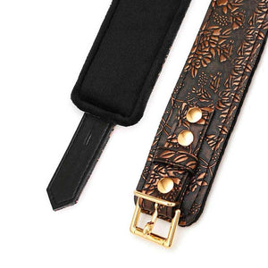 A close-up of The Vegan Floral Collar With Faux Fur And Leash Set is displayed against a blank background, showing the black faux fur lining of the collar.