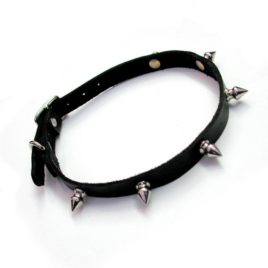 The BDSM Spiked Leather Choker with a D-Ring is shown against a blank background. The spikes on the collar have flat backs on the collar's interior.