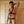 Load image into Gallery viewer, A nude man stands in front of wooden doors. He is wearing the Leather Torso Harness. A leather strap runs down the middle of his body to his cock, which is pulled through a metal O-ring. Other straps loop over his shoulders and around his torso, secured with metal buckles.
