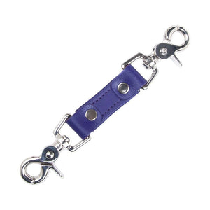 The purple Premium Garment Leather Restraint Clip is displayed against a blank background. It is a short piece of purple leather with silver metal rivets and a metal snap hook on each end.