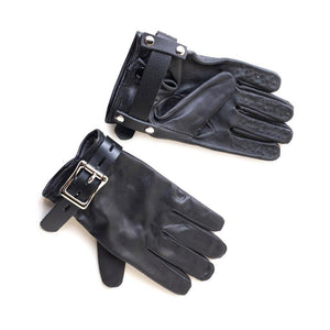 A pair of Hands Off Locking Vampire Gloves are shown against a blank background. They are made of black leather with a buckling black leather strip around the wrists. The fingers on the palm side of the glove are covered in tiny spikes.