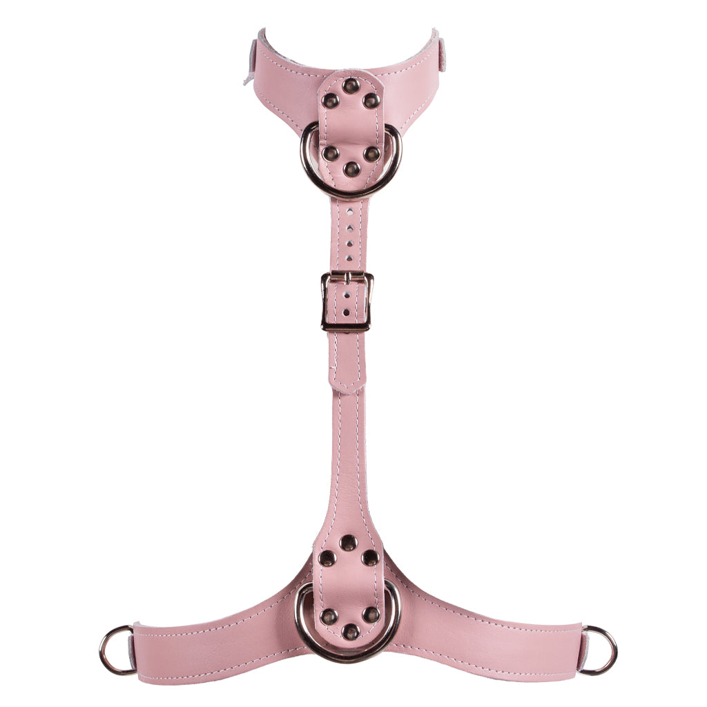The pink leather Stupid Cute bust harness is shown on a white background