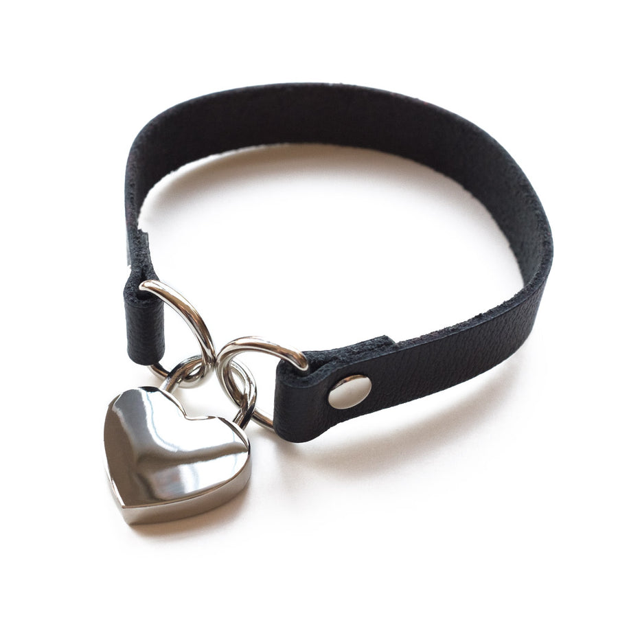 The black Heart Lock Choker is shown against a blank background.