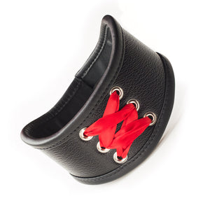 The Red Laced BDSM Posture Collar is shown against a blank background. The collar is black leather with two rows of three silver grommets in the center and a red ribbon laced through them.