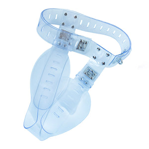 The Clear CTRL Deluxe Locking Chastity Belt is shown against a blank background. It is made of transparent PVC with silver hardware. The belt consists of a waist belt with another hourglass-shaped belt that goes between the legs.