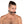 Load image into Gallery viewer,  A man with dark brown hair that is shaved on the sides and pulled into a ponytail is shown wearing the Kinklab Silicone Bit Gag against a blank background.
