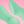 Load image into Gallery viewer, A closeup of two Fun Factory Sundaze Pulsating Vibrators in Pistachio are shown against a pink background, displaying the contours of the tip of the toy. 
