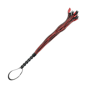 The Saffron Braided Flogger is shown against a blank background. It is a red and black BDSM impact play tool.