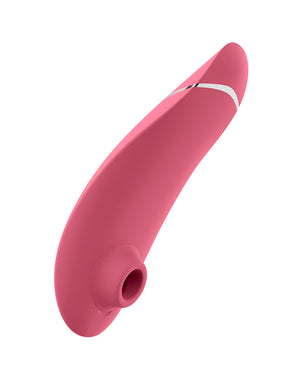 The Womanizer Premium 2 in Raspberry is shown from the side against a blank background.