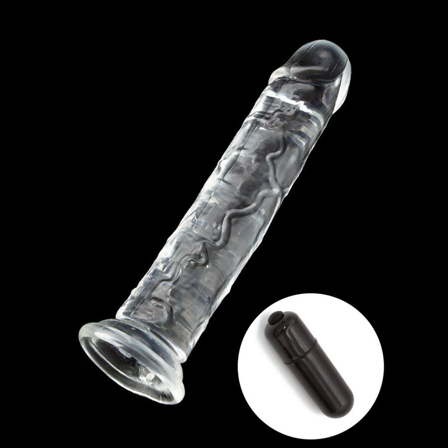 The Crystal Addiction Clear Jelly Dildo, 7” that includes a mini black bullet vibrator with a press power button on a black background.