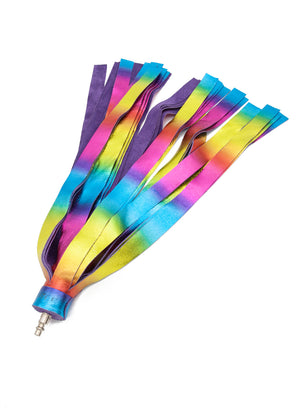 The Metallic Cow Leather Interchangeable Flogger Head 1" in Rainbow is shown against a blank background. The leather strips are a rainbow gradient on the metallic sides, and the backsides are purple. 