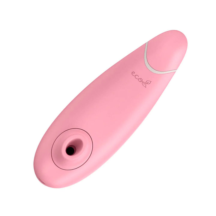 A rose colored Womanizer Eco vibrator is shown from the front against a blank background.