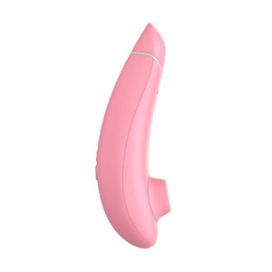 A rose colored Womanizer Eco vibrator is shown from the front against a blank background.