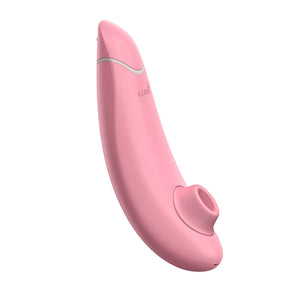 A rose colored Womanizer Eco vibrator is shown from the front against a blank background.